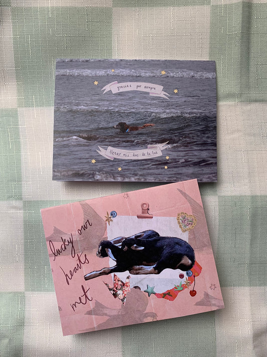 “Lucky our hearts met” postcard