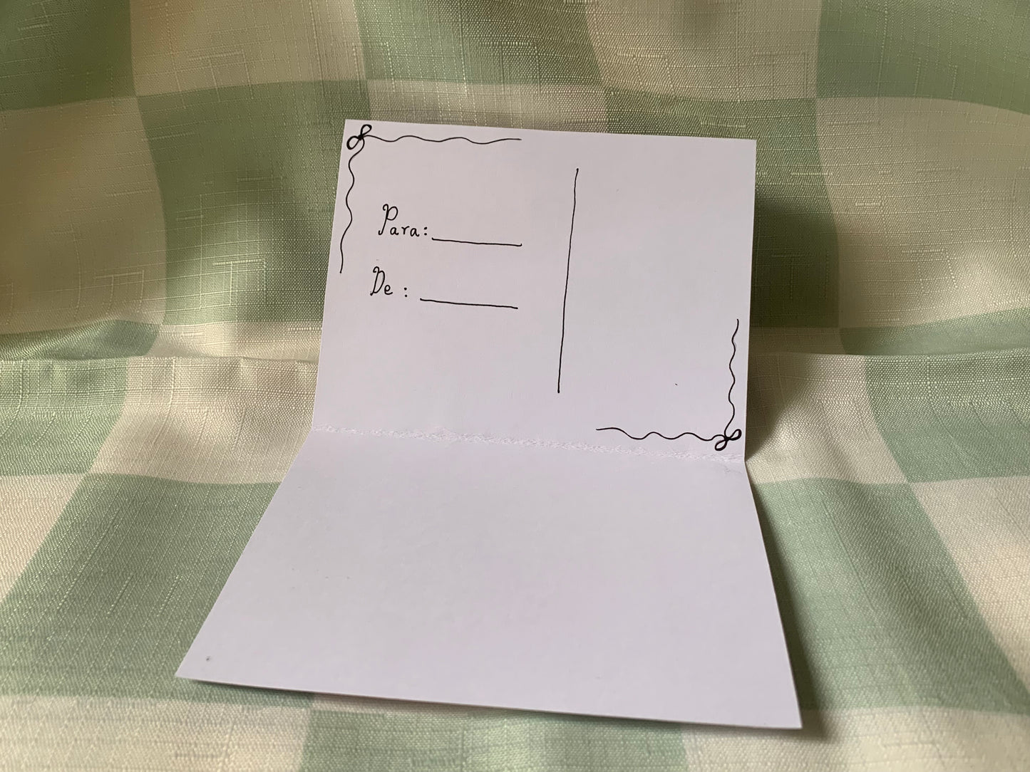 “Lucky our hearts met” postcard